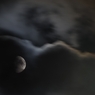 流れる雲と月
