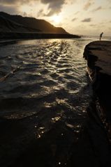 海に注ぎ込む流れ