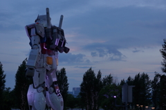 Gundam statue at dusk