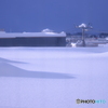 隣の屋上の雪