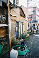 Boy and a fish pond 