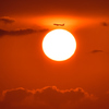夕日を飛び越えて。。。