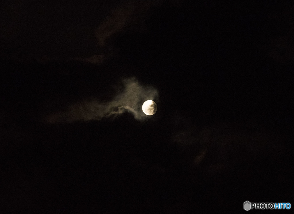 The moon plays with the clouds