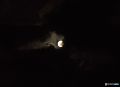 The moon plays with the clouds