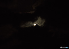 The moon plays with the clouds