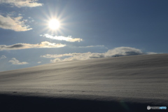 雪原が焼ける用な光