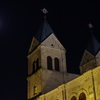 a church with the bright moon