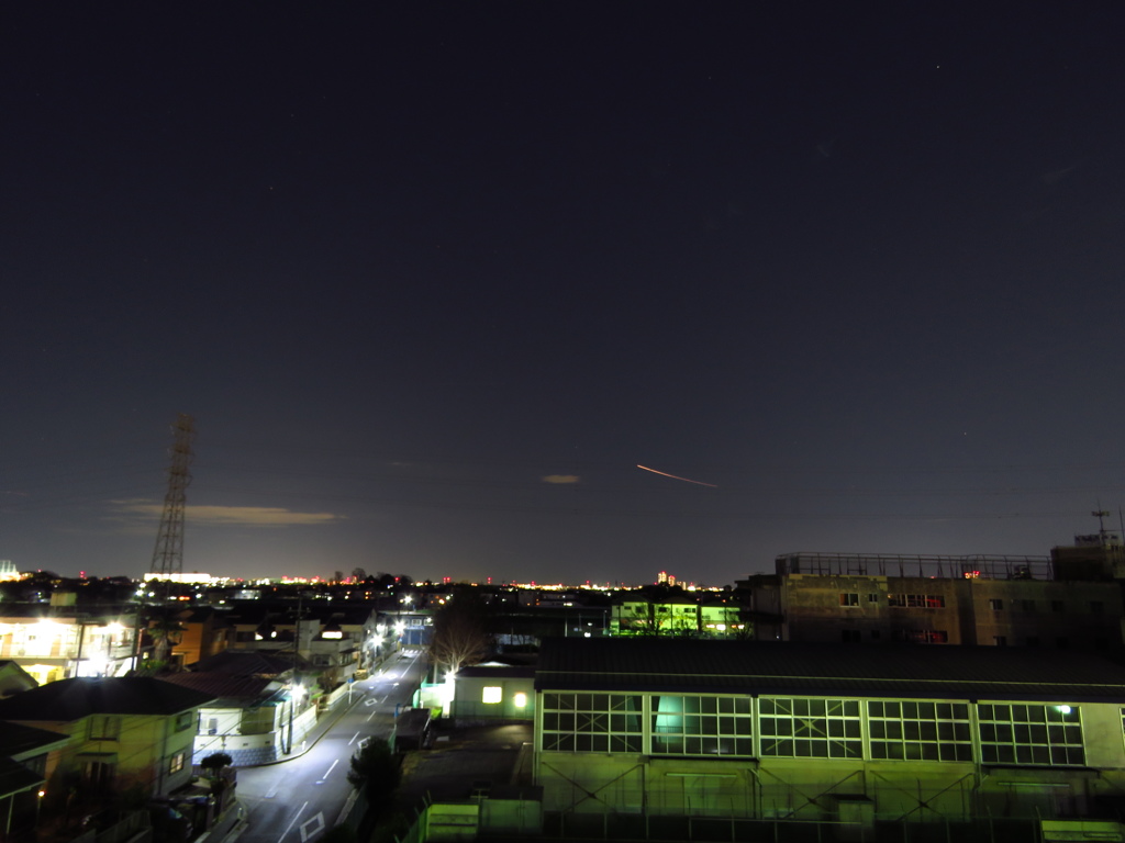 夜の飛行機雲