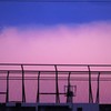 フェンスの向こうの夕雲
