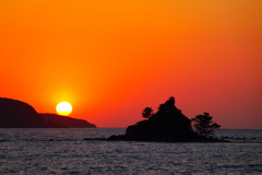 日没どきの島影