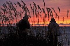 夕焼撮るカメラマン