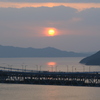 夕日と電車と大橋と