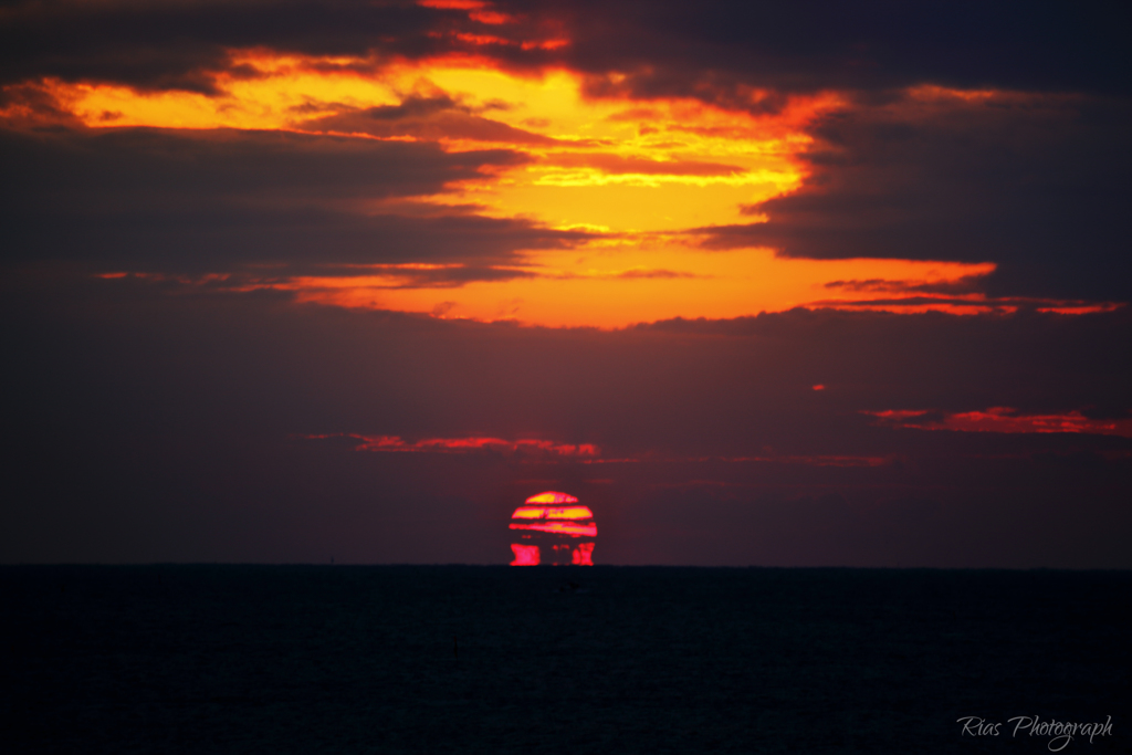 -ΩSUN-