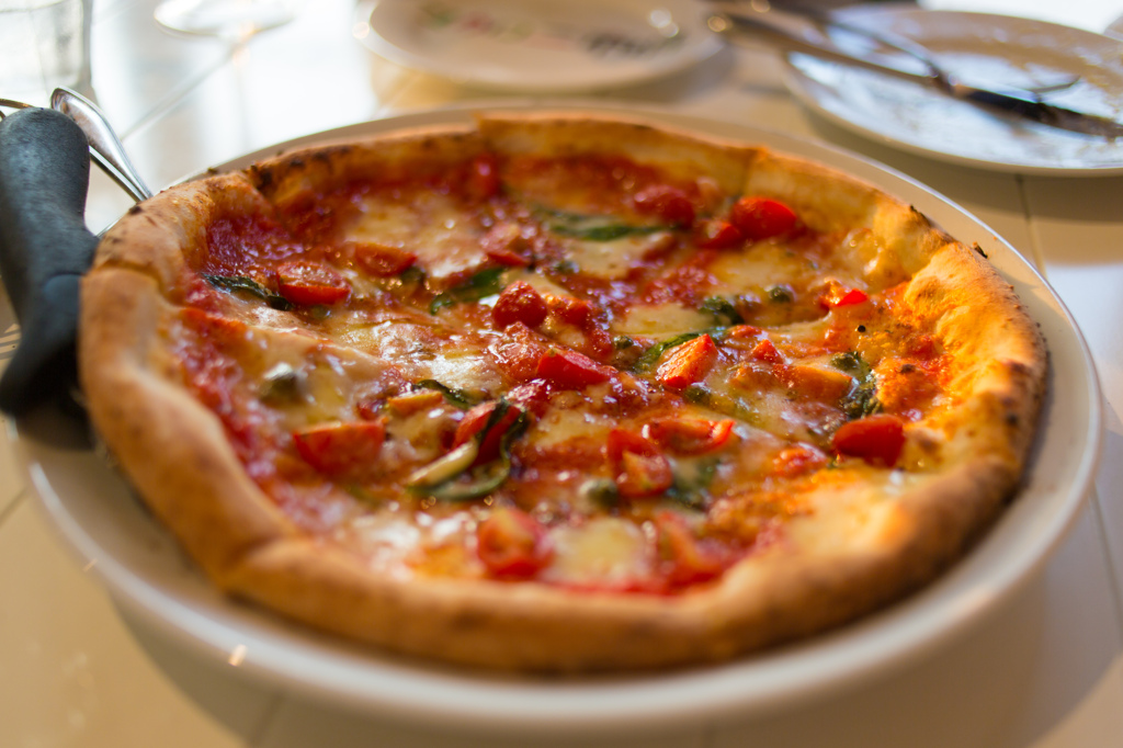 Pizza with tomato and anchovy