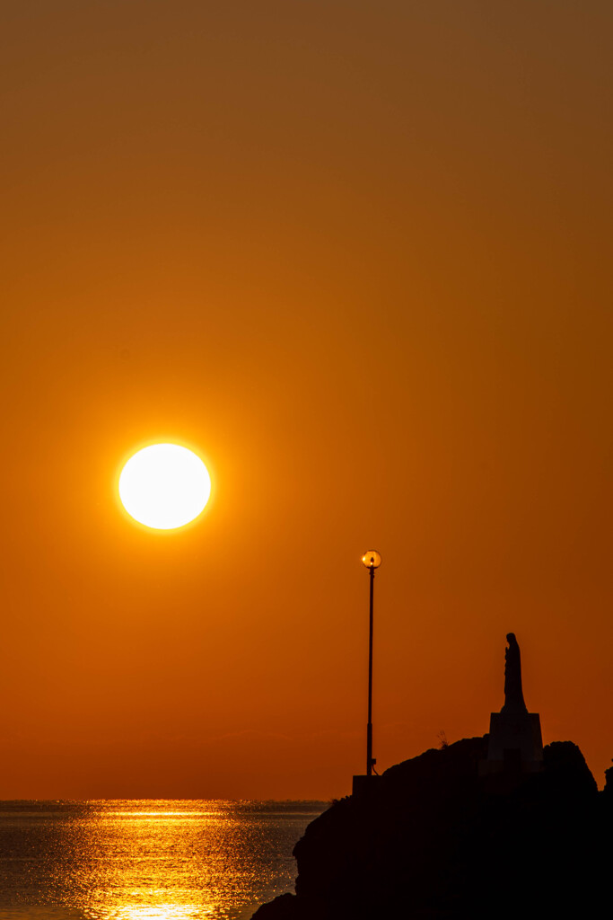 マリア像の夕陽