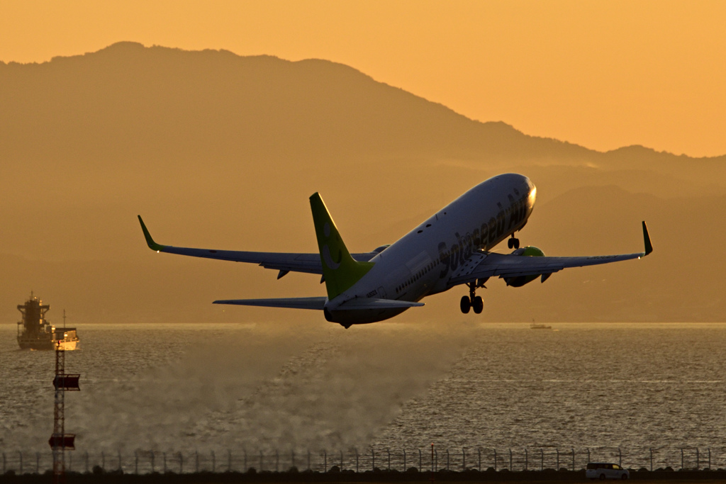 夕染めの空へ