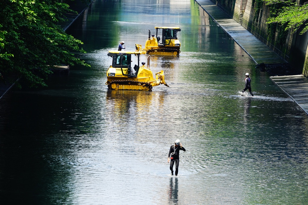 Bulldozers working in the Megro river