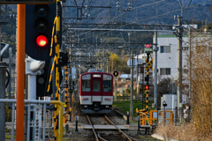 去り行く背中。