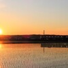 夕陽と水田と列車　その１