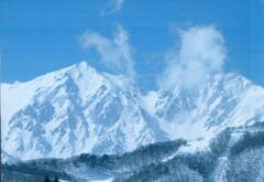 「常念岳と雪けむり」