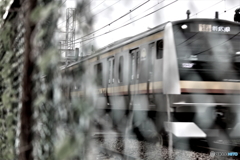 金網ごしの風景