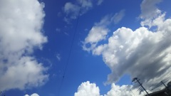 コンビニ帰りの夏の空