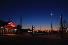 TWILIGHT ON NEARBY LIQUOR SHOP