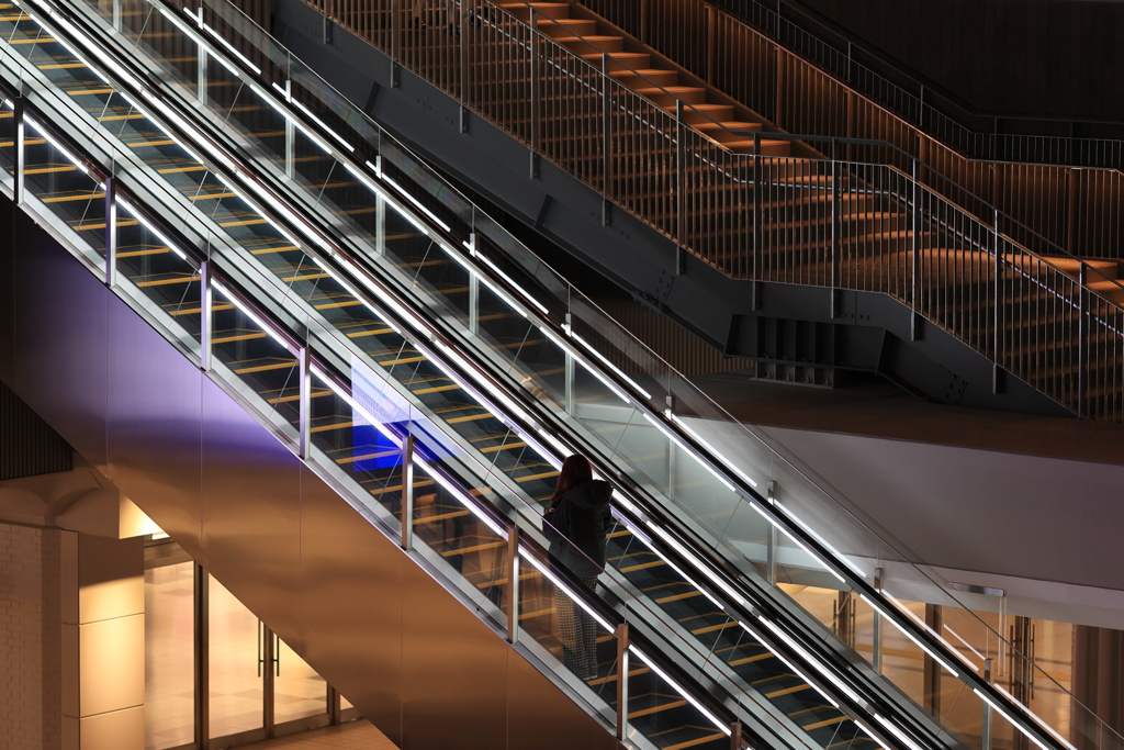 Going up on the escalator