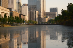 A city bathed in the setting sun