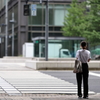 A woman is waiting for a signal