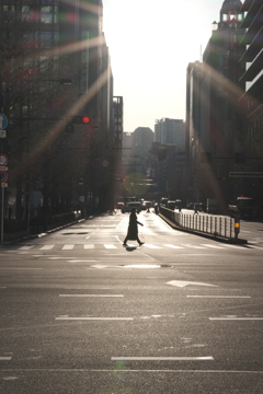 A man crossing a crosswalk