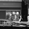 two women, two mannequins and a car