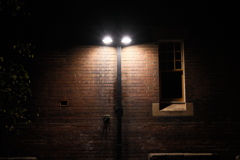 bricks illuminated by street lamps