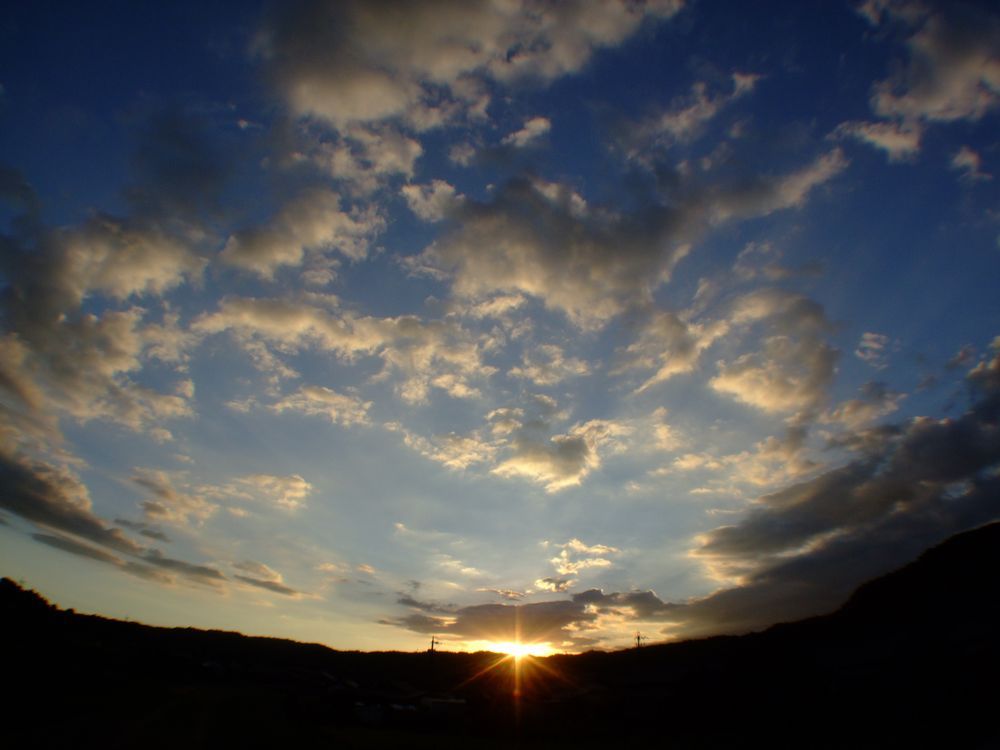 夕日と共に暑さも沈め