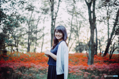 A girl in a garden of cluster amaryllis