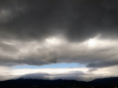 明日は雨