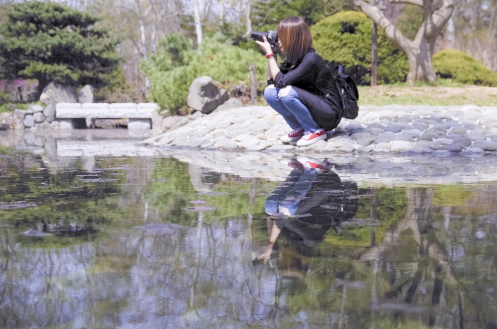 水面に写るフォトグラファー