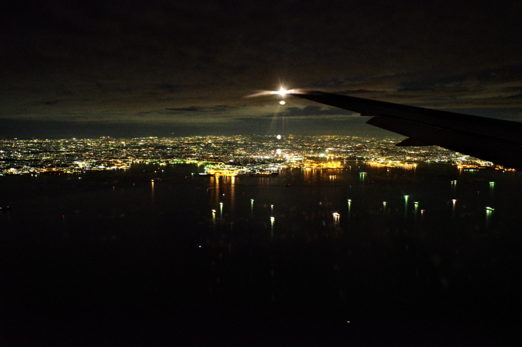 飛行機から東京を撮ってみた。難しいです・・・。