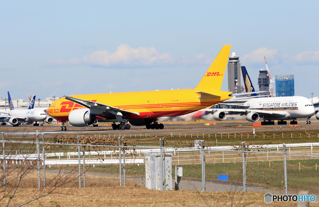 「はれ」DHL 777-FBT D-AALM 飛び立ち