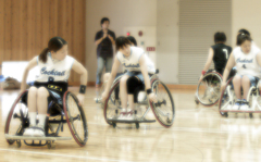 Three people fighting.