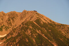 夕陽染まる雄山