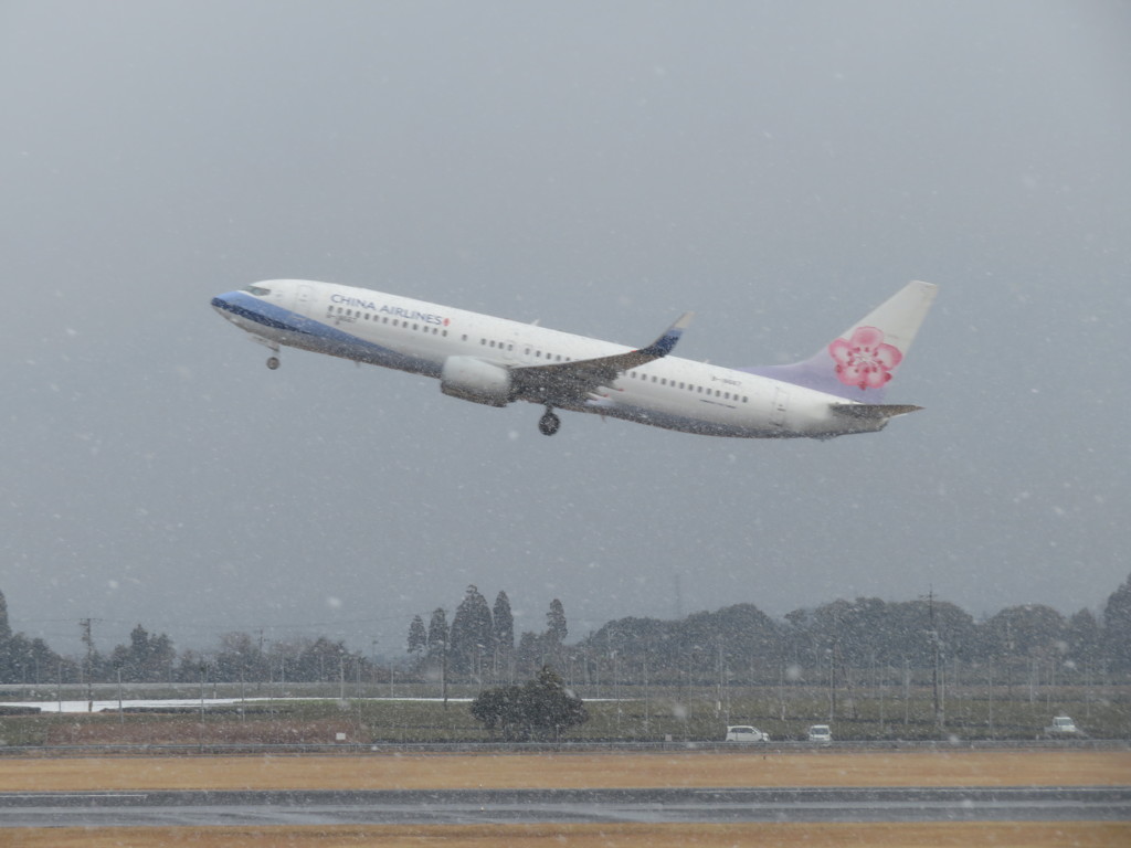 雪の中の離陸