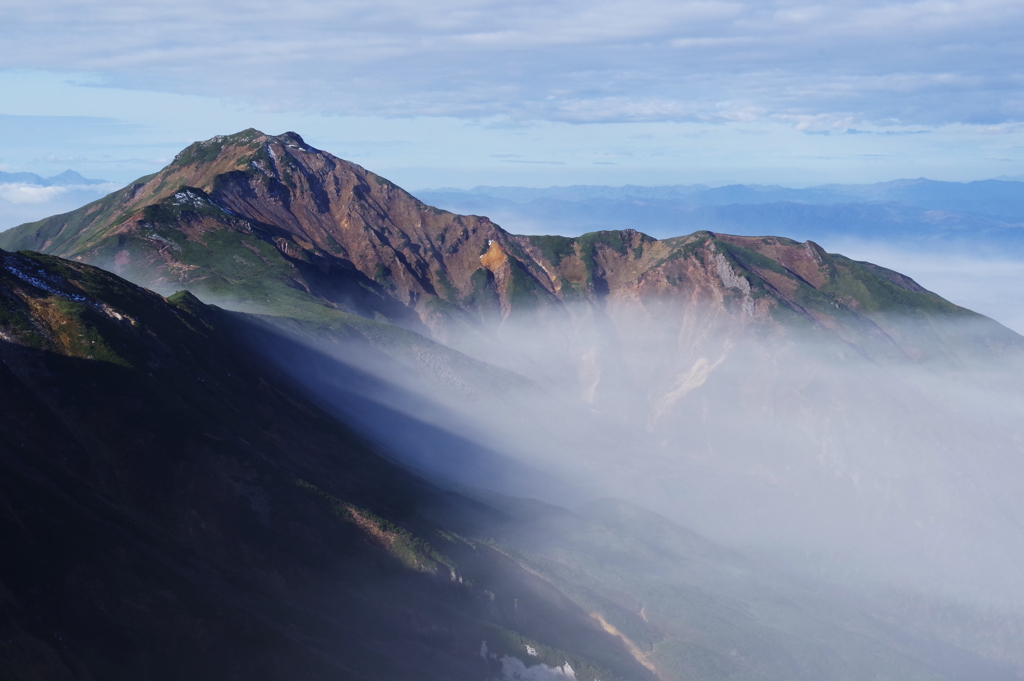 日の当たる雲