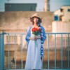 バラを持つ彼女・・・・