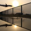Reflection of wire netting and airplane