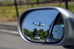 Airplane in Door mirror