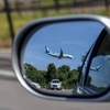 Airplane in Door mirror