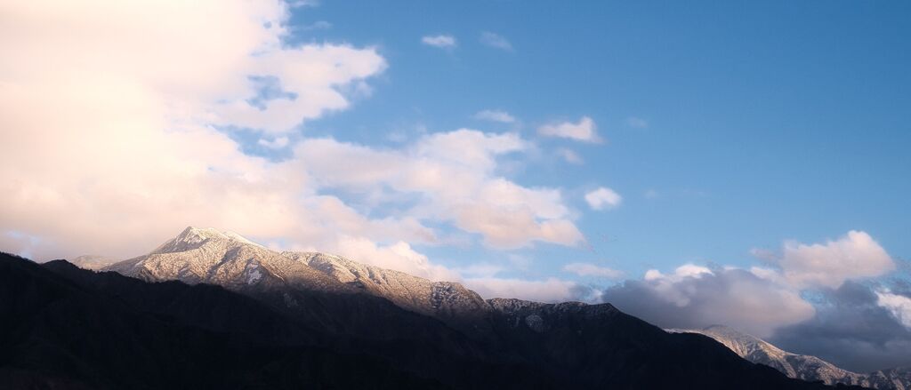 巻機山照らされて