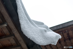 積もる雪
