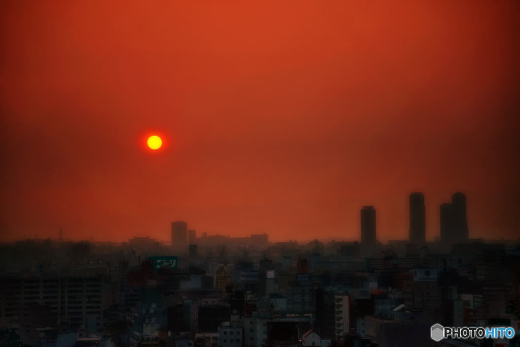 ガラス越し夕日